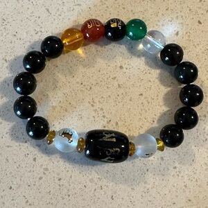 Multi color Charm Bracelet With Hanging Charms Stretch Bracelet good condition